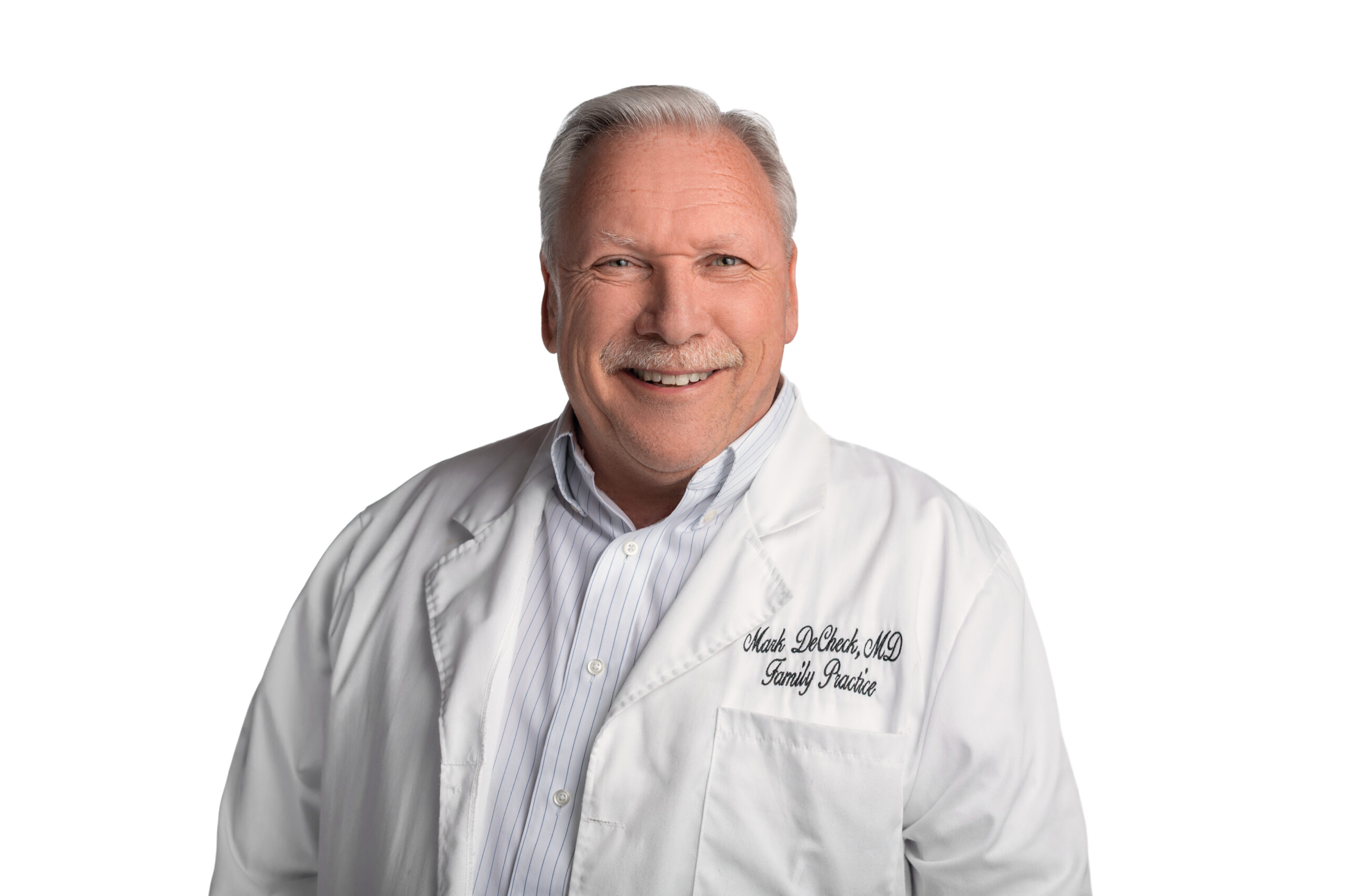 Physician headshot in Racine, WI showing approachable, professional healthcare provider.