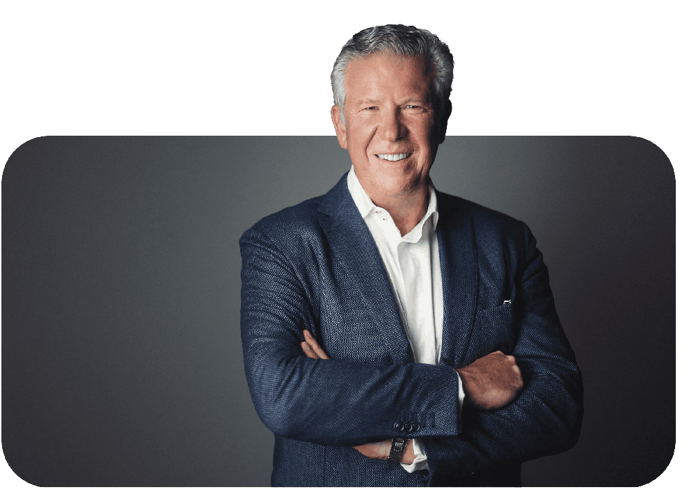 Professional headshot of confident silver-haired man in blazer by Varitay Studios, Racine WI
